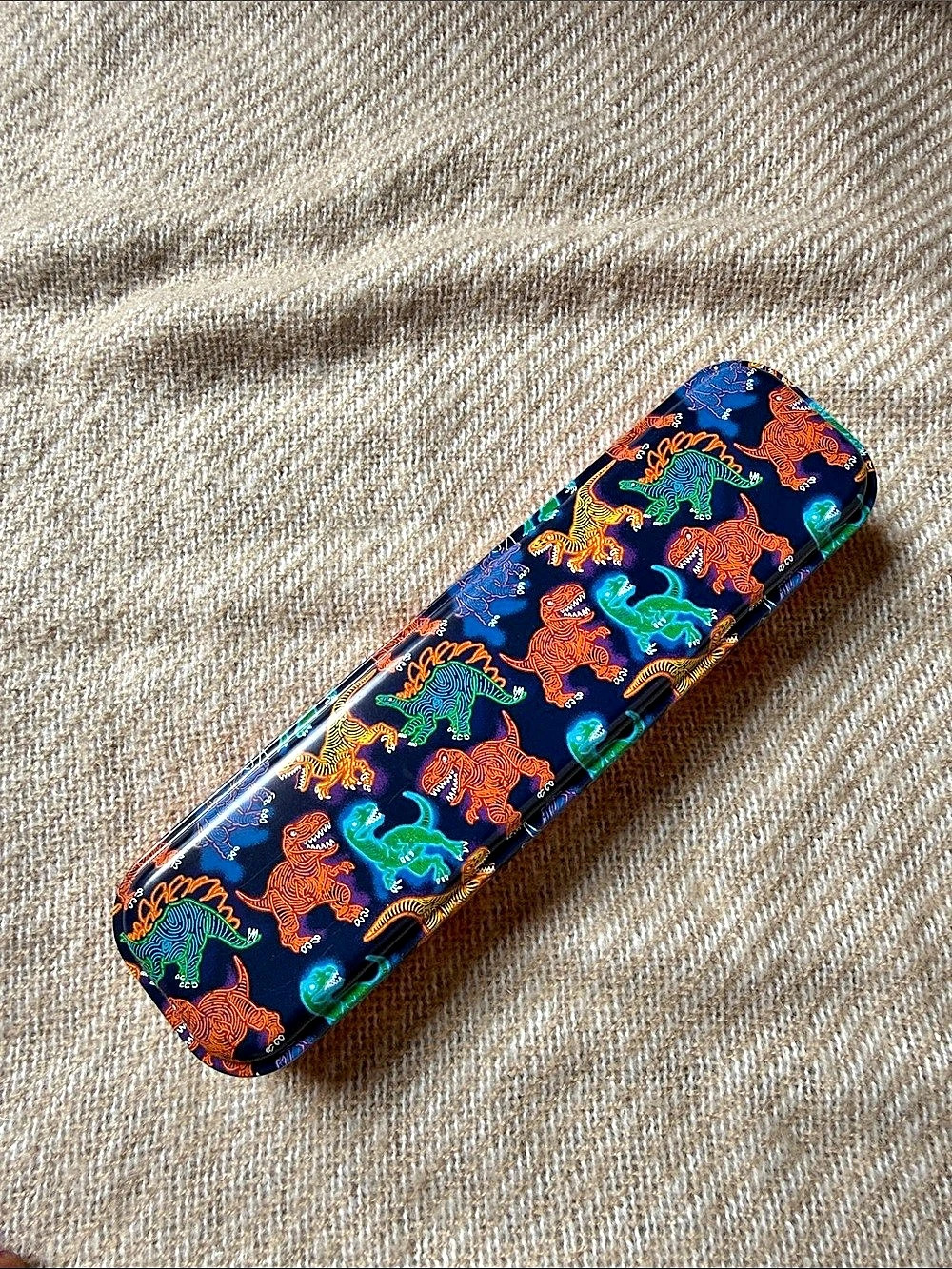 Dinosaur tin Pencil Case in Orange & Blue